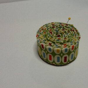 Coiled quilt binding roll