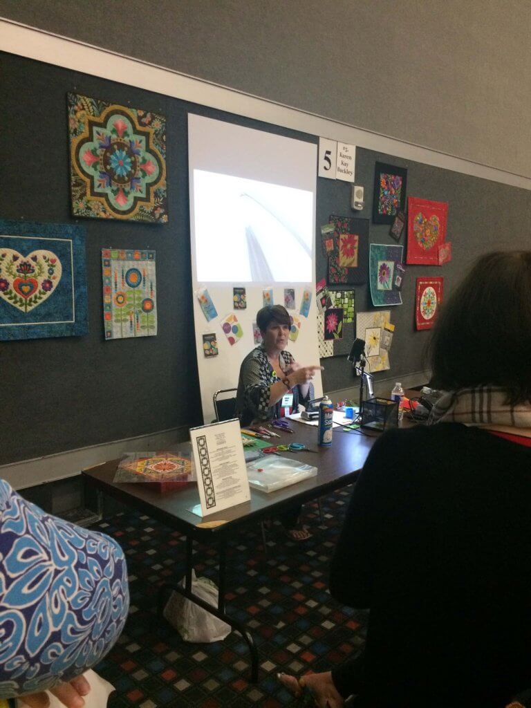Karen K Buckley teaches how to make perfect applique points at the 2017 Houston International Quilt Festival