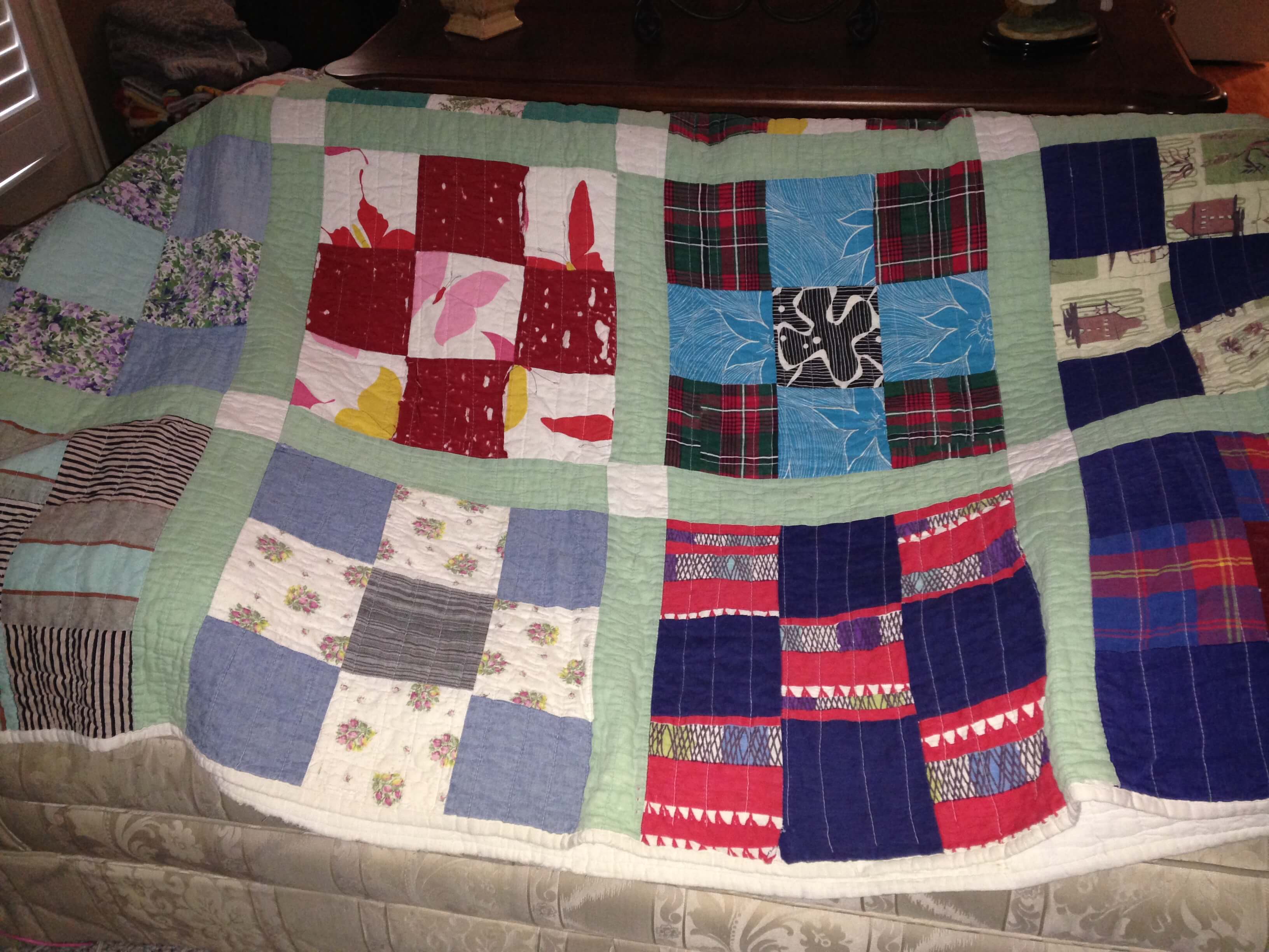 A family treasure. My mom's scrappy nine-patch quilt made for her by her sister from outgrown clothes.