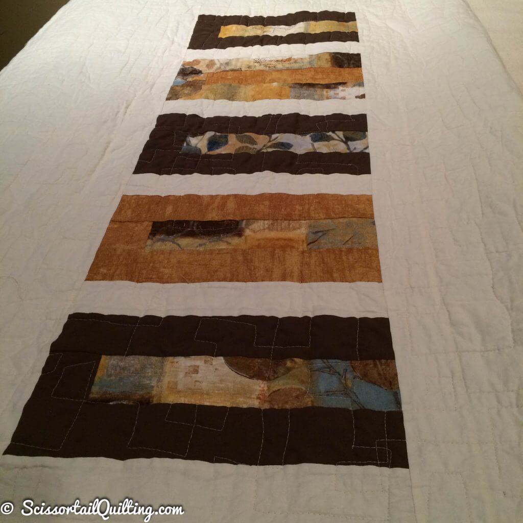 Photo of backside of modern rectangles quilt