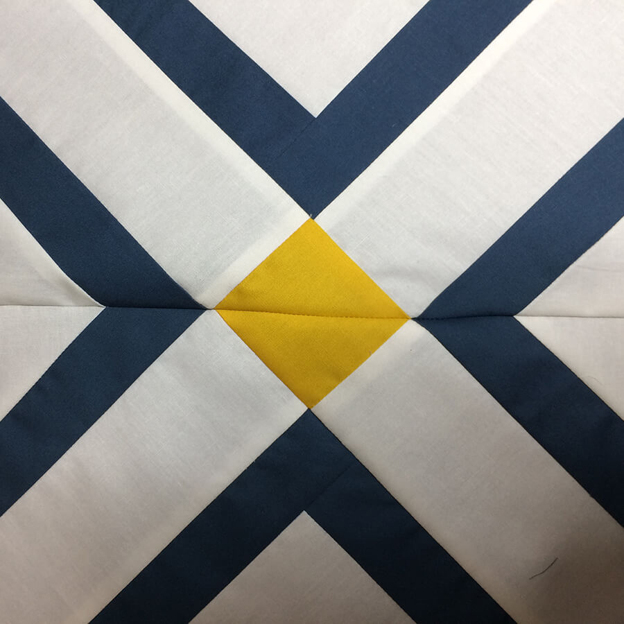 Photo showing Matching seams on two Mingle Quilt Blocks