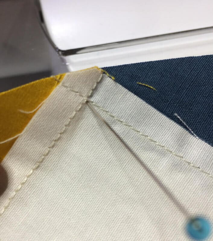 photo of inserting pin to match seams, side 1