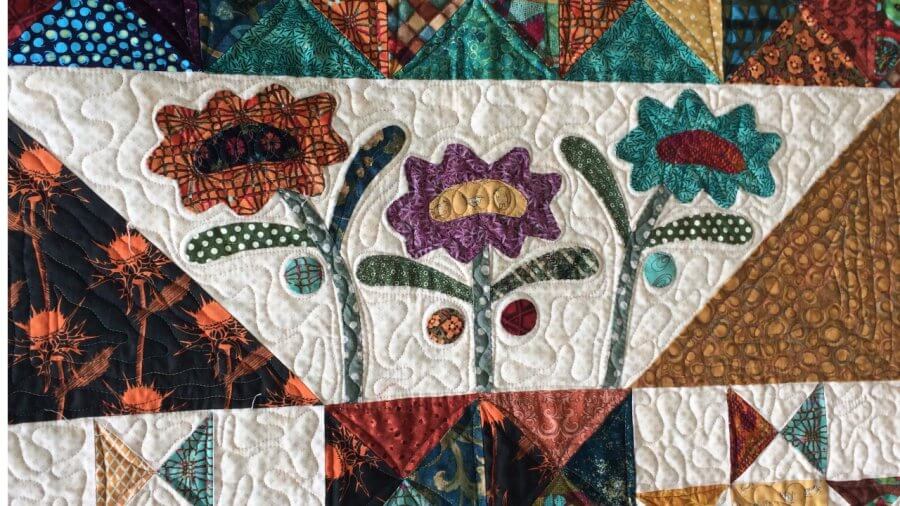 Applique on Late Bloomer Quilt designed by Kim Diehl's 