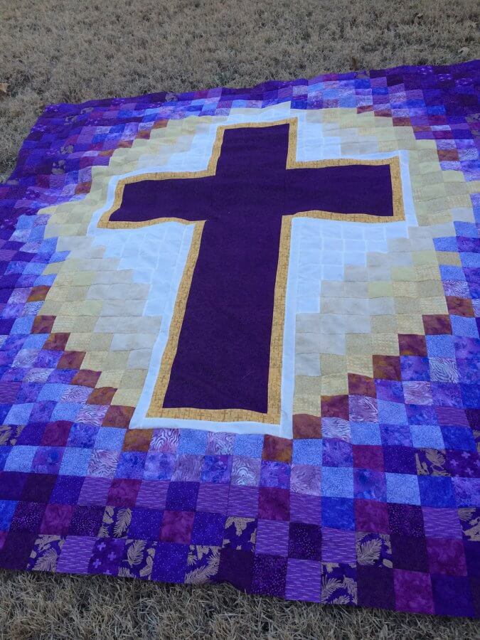 Photo of Completed cross quilt top