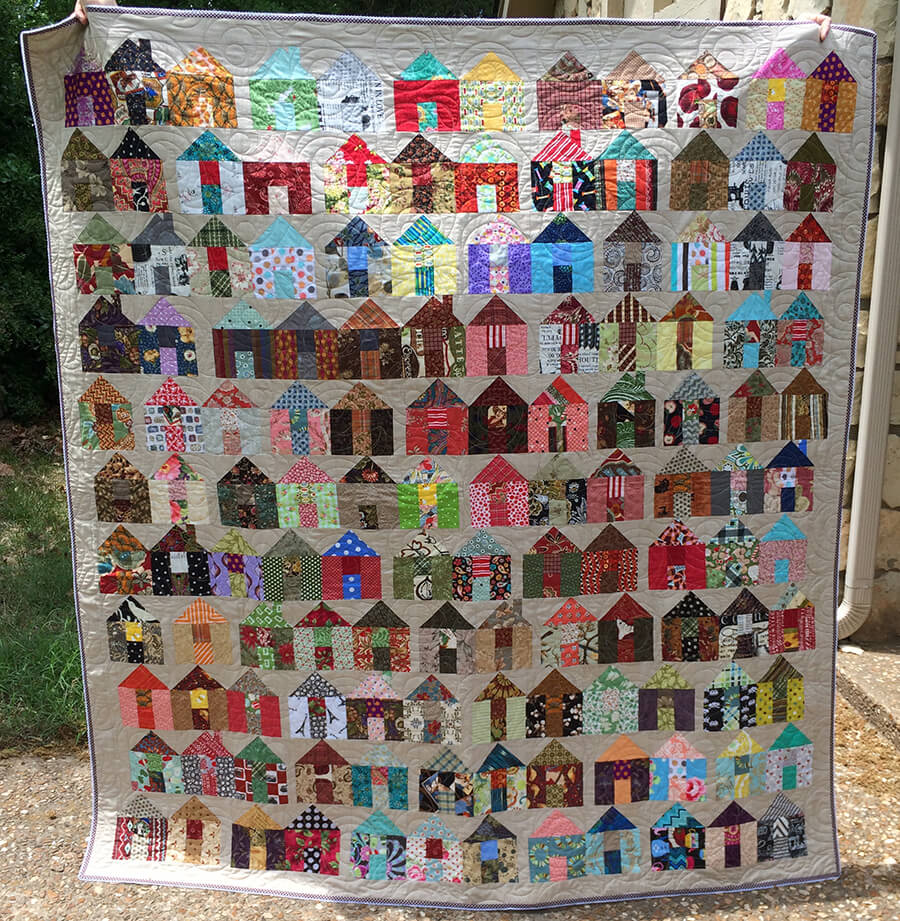 Photo of Carrie Nelson's Quilt Pattern with lots of scrappy house blocks