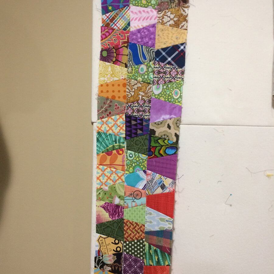 Photo of a border made of tumbler blocks