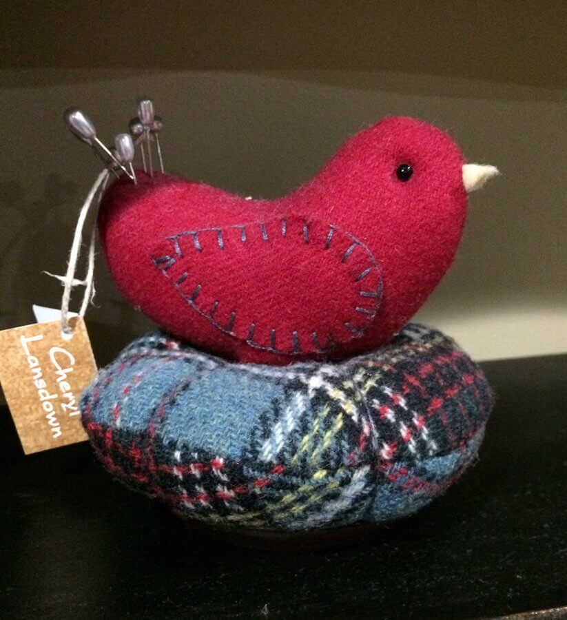 Photo of a red bird pin cushion