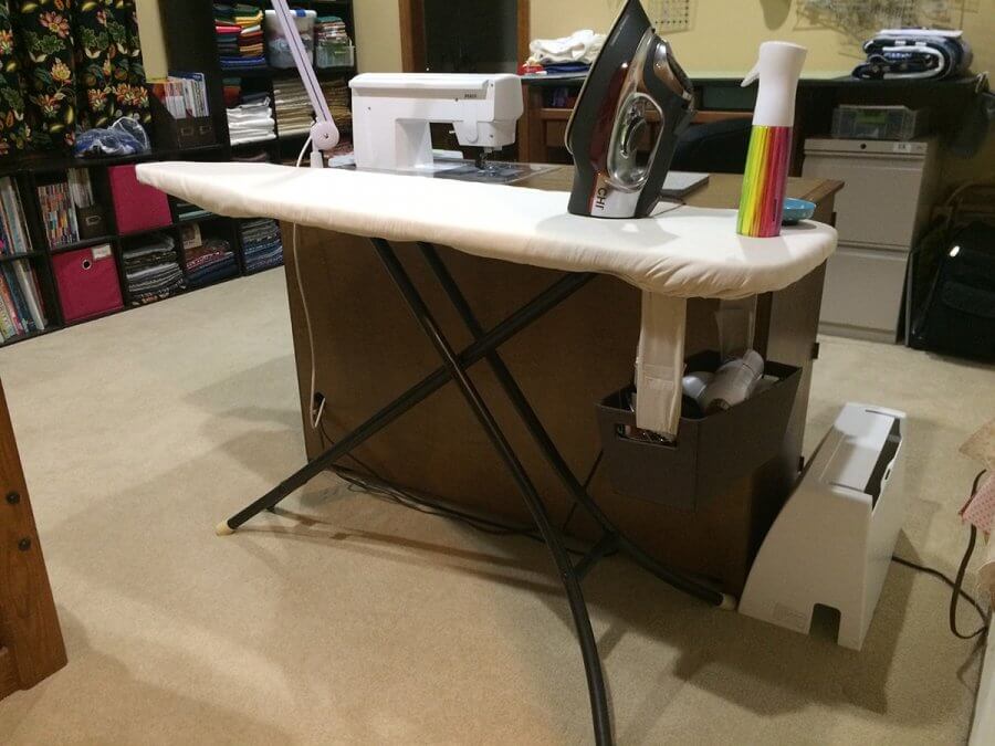 Photo of ironing board set up in sewing room