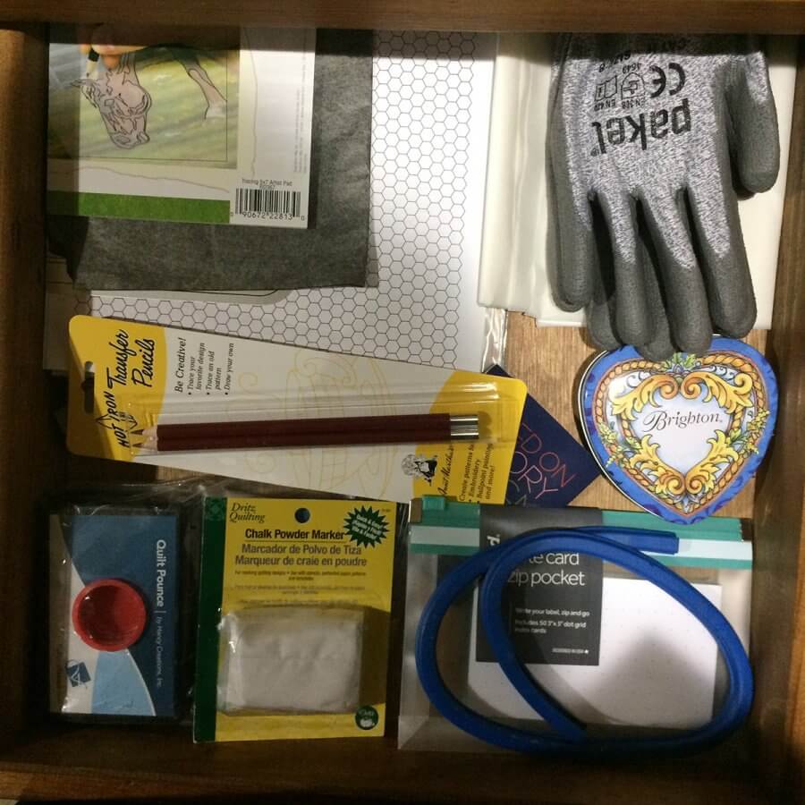 Photo of drawer holding sewing notions