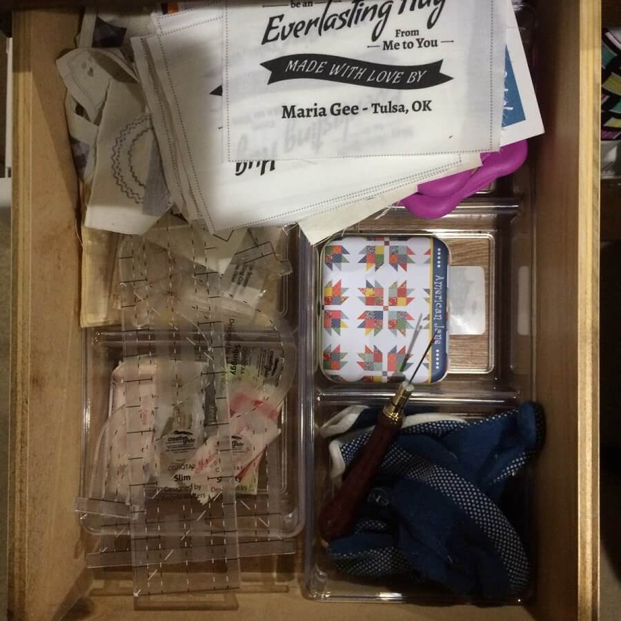 Photo of a drawer containing sewing notions