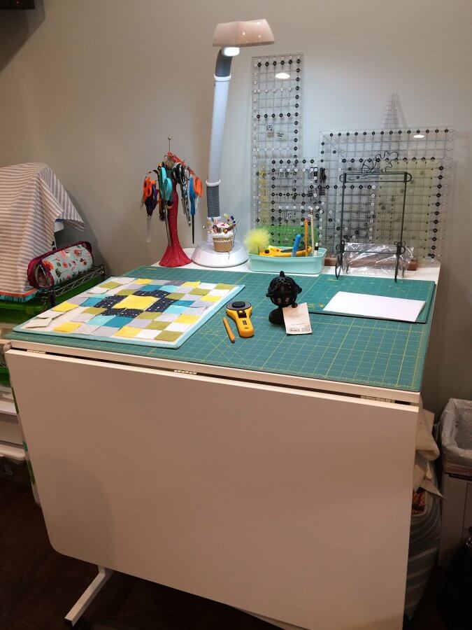 Photo of cutting table in sewing room