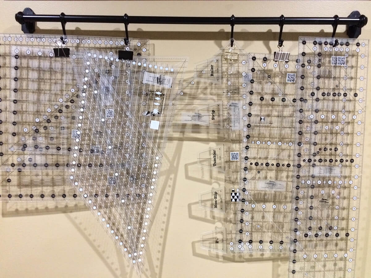 Photo of a rack of acrylic rulers used in quilting