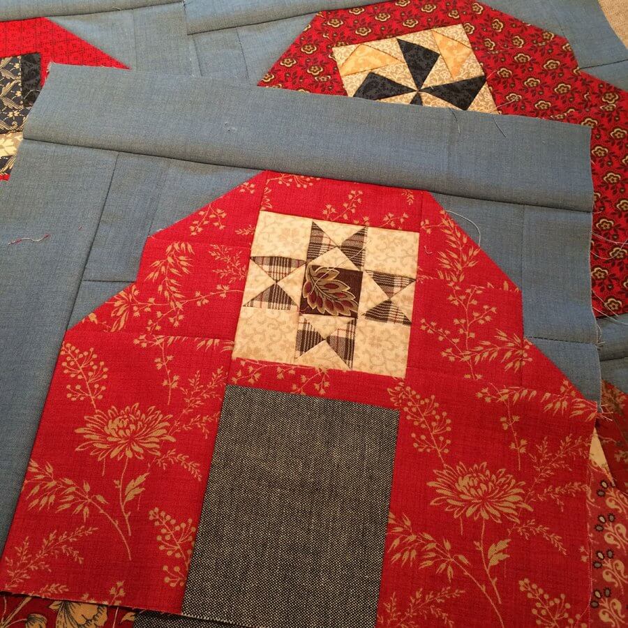 Photo of ohio star patchwork set in a barn quilt block