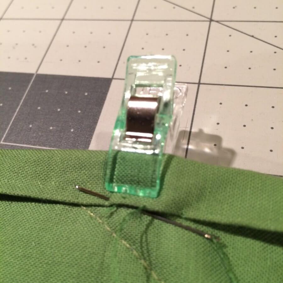 Photo showing how the needle should enter and exit when sewing binding