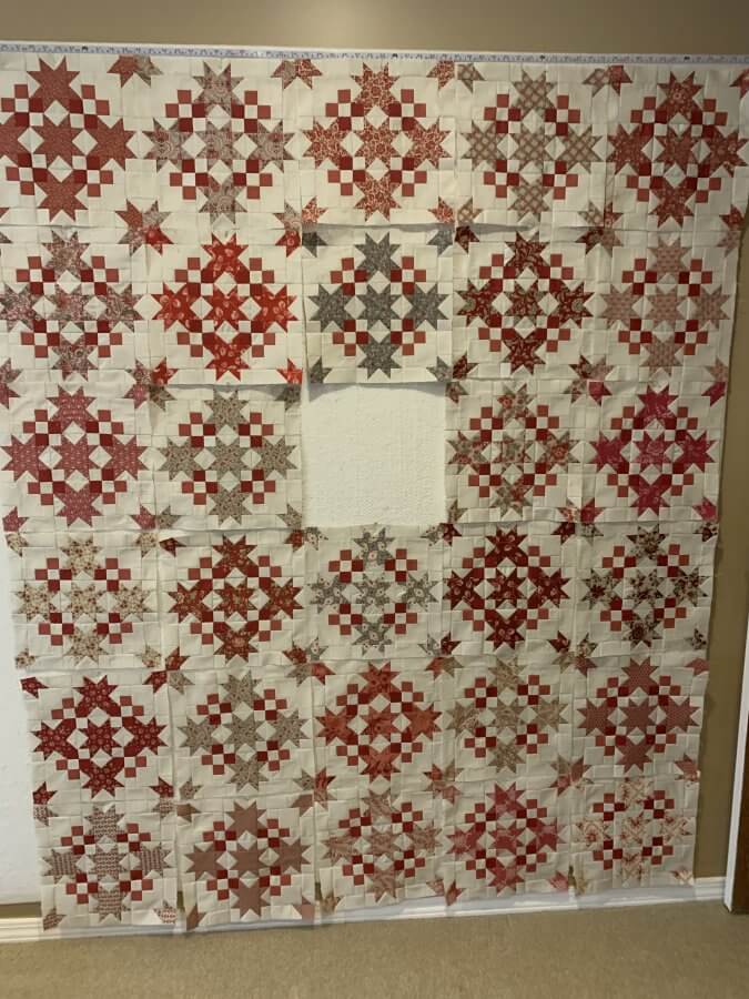 Photo of quilt blocks on a design wall